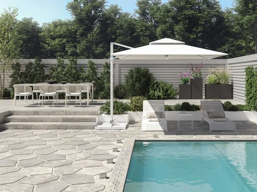 Clean concrete pool patio at an Avalon, NJ beach house after professional pressure washing — removing algae, calcium deposits, and slip hazards from pool deck surfaces.